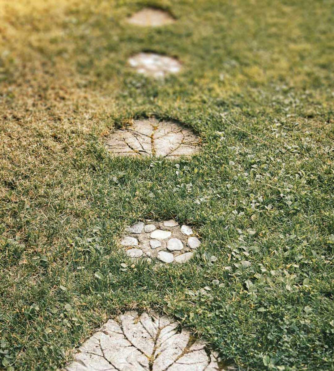 A serene path leading towards a ceremonial space, symbolizing the journey of preparation for a significant ritual or event."